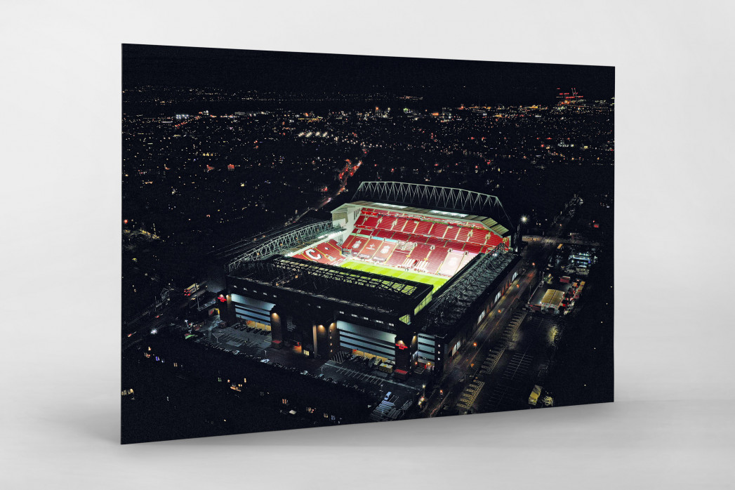 Wandbild: Anfield leuchtet bei Nacht - Luftbildaufnahme des Stadions vom FC Liverpool
