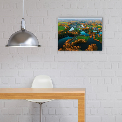 Fußballplatz in französischer Seenlandschaft - Foto als Wandbild