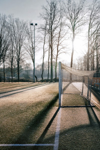 Wandbild: Sunset Soccer - Trainingsplatz des FC St. Pauli im Hochformat - Olli Mueller Photography